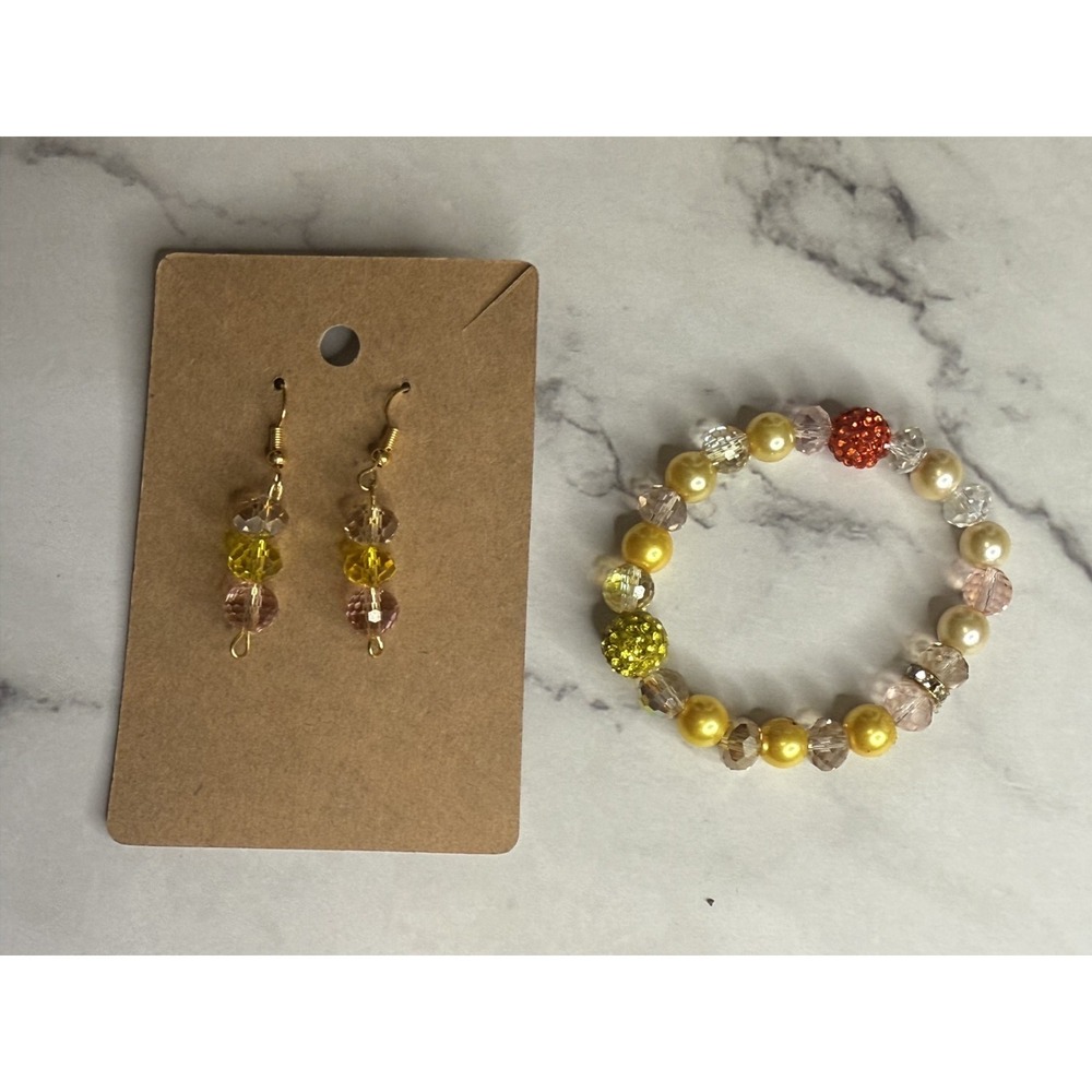 handmade beaded earrings and bracelets set yellow, pink and red beads